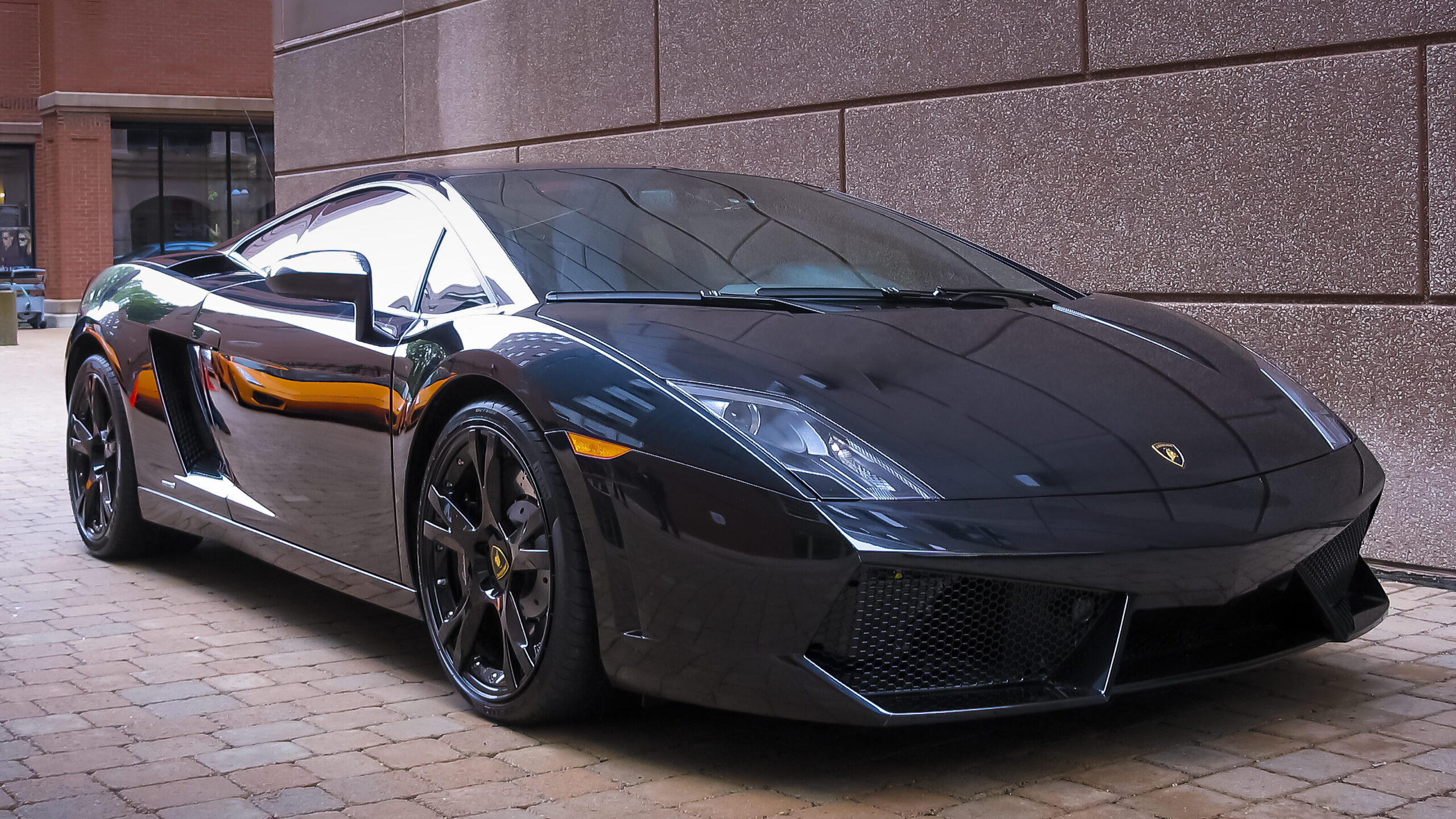 Halifax, Nova Scotia, Canada Side view of a black Lamborghini. Car shipping, enclosed car transport.